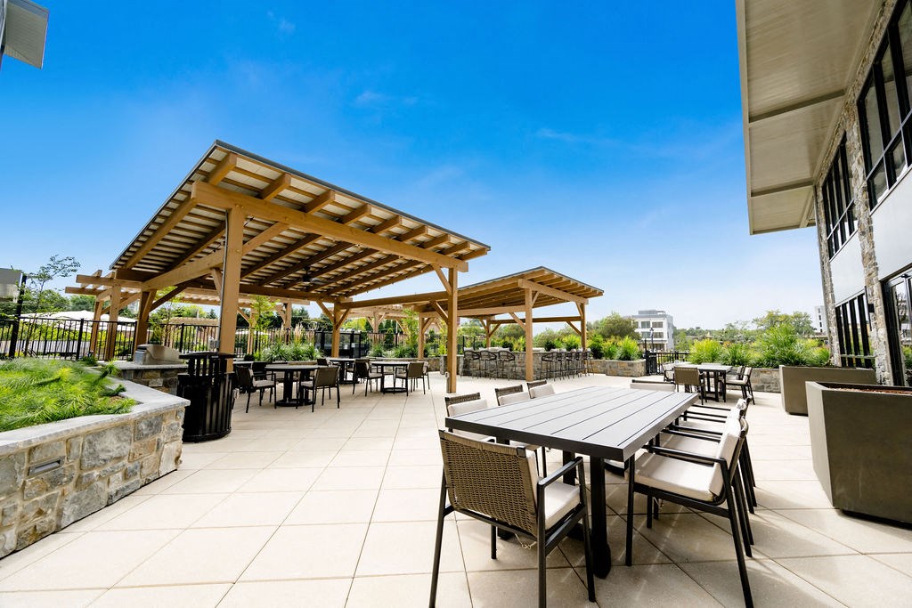 a restaurant or other place to eat on a patio at The Harrison, Newtown Square, 19073