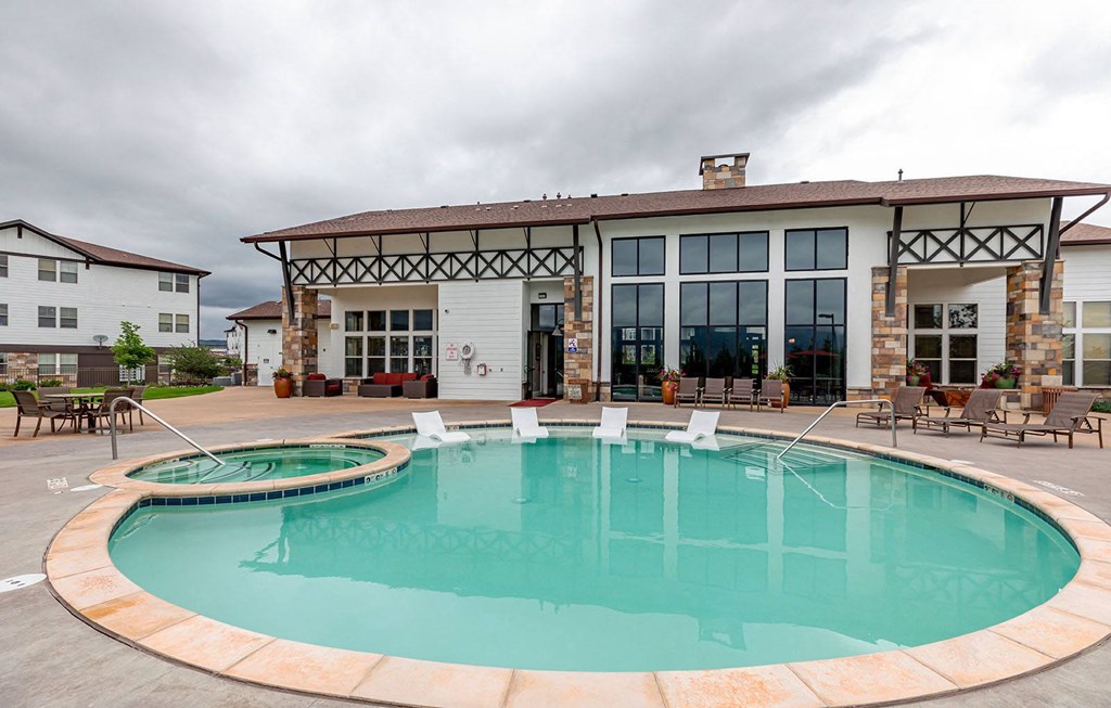 Pool with clubhouse at Vistas at Jackson Creek, Monument, CO