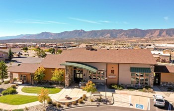 Clubhouse with mountains in backdrop Clubhouse with mountains in backdrop at Vistas at Jackson Creek, Monument, 80132 - Photo Gallery 4