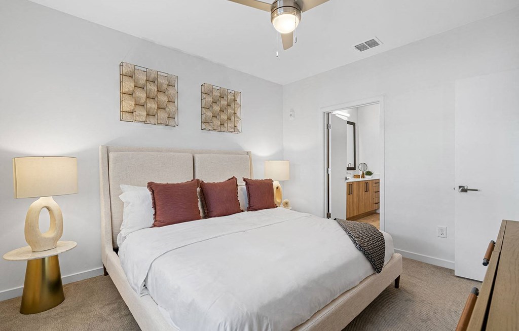 a bedroom with a bed and a closet at Madison Waterford Lakes, Florida, 32826