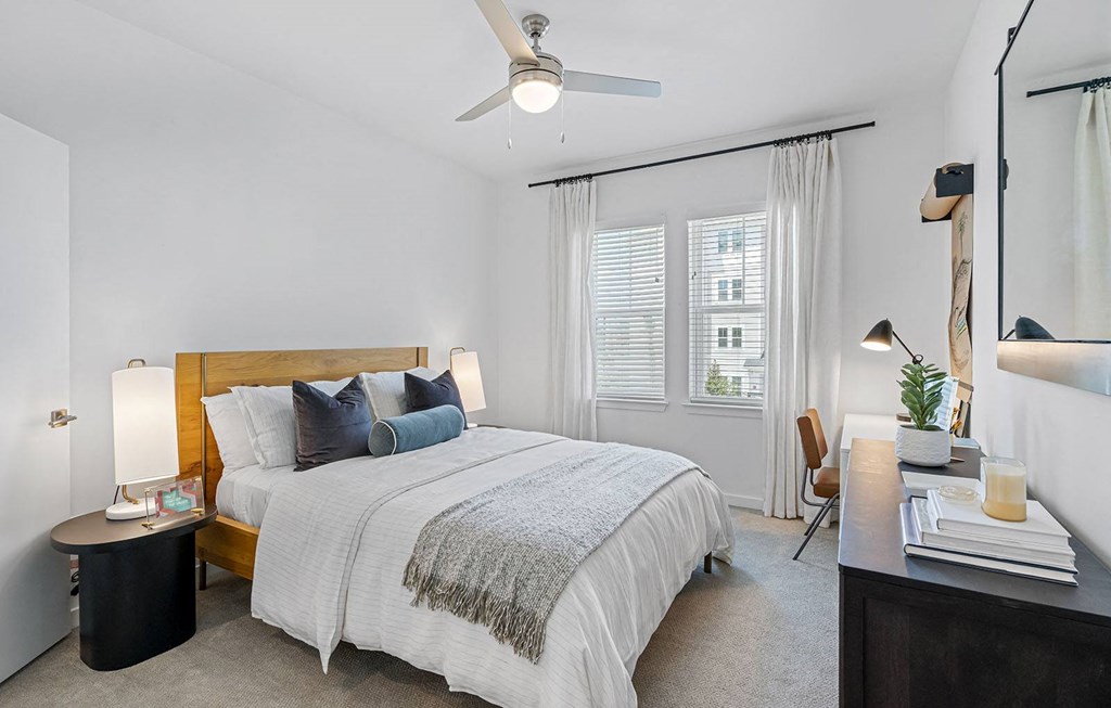 a bedroom with a bed and a ceiling fan at Madison Waterford Lakes, Orlando, 32826