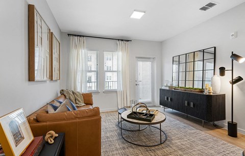 a living room with a couch and a table