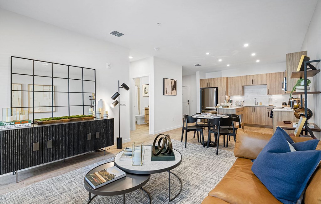 a living room with a couch and a table at Madison Waterford Lakes, Orlando, 32826