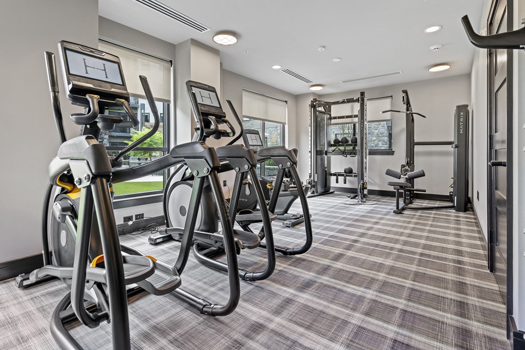 the gym at the enclave at woodbridge apartments in sugar land, tx at The Harrison, Newtown Square, Pennsylvania