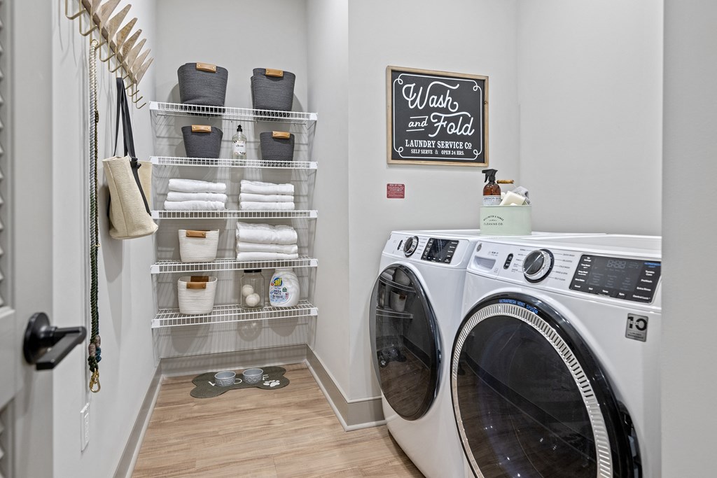 a laundry room with a washer and dryer at The Harrison, Newtown Square, PA, 19073