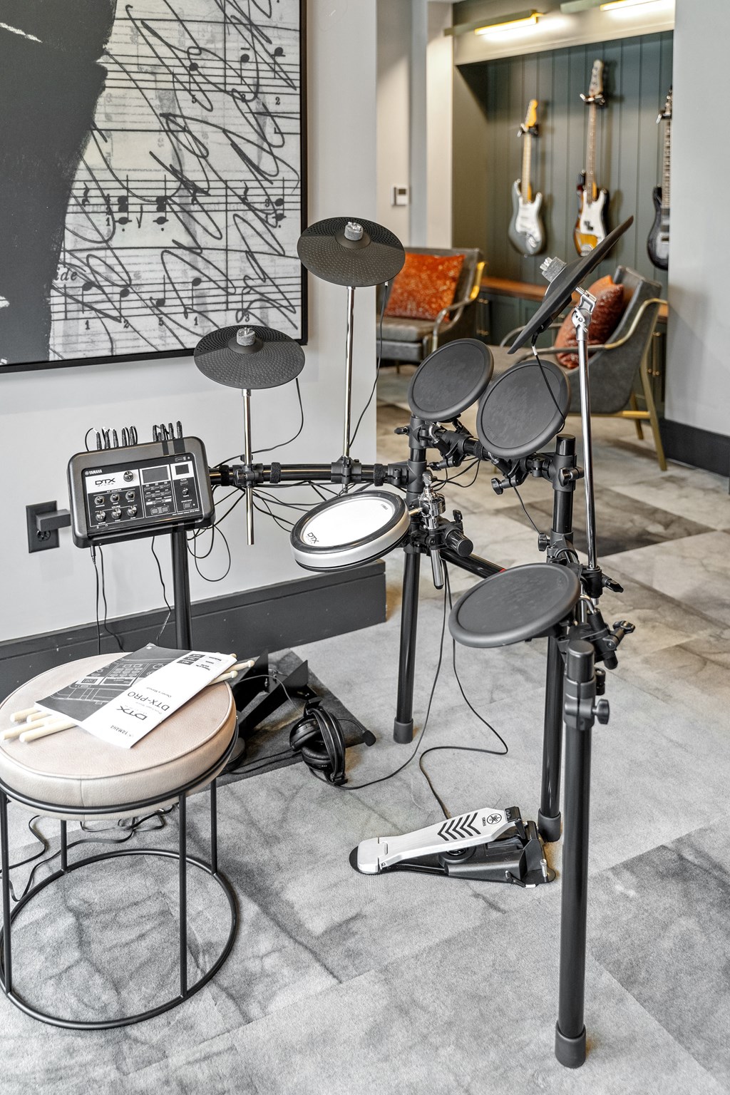 a drum set sits in front of a wall with a black and white map at The Harrison, Newtown Square, PA, 19073