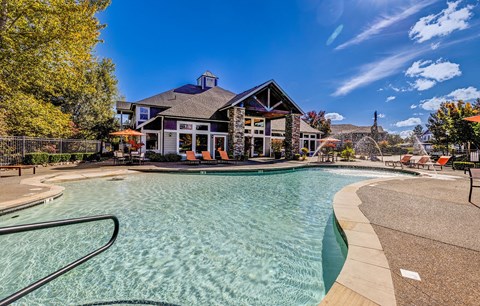 Resort style swimming pool with a sundeck at Madison Sierra Sun, Puyallup, 98374