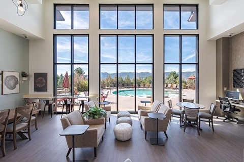 Clubhouse with view out of huge wall of windows at Vistas at Jackson Creek, Monument, CO