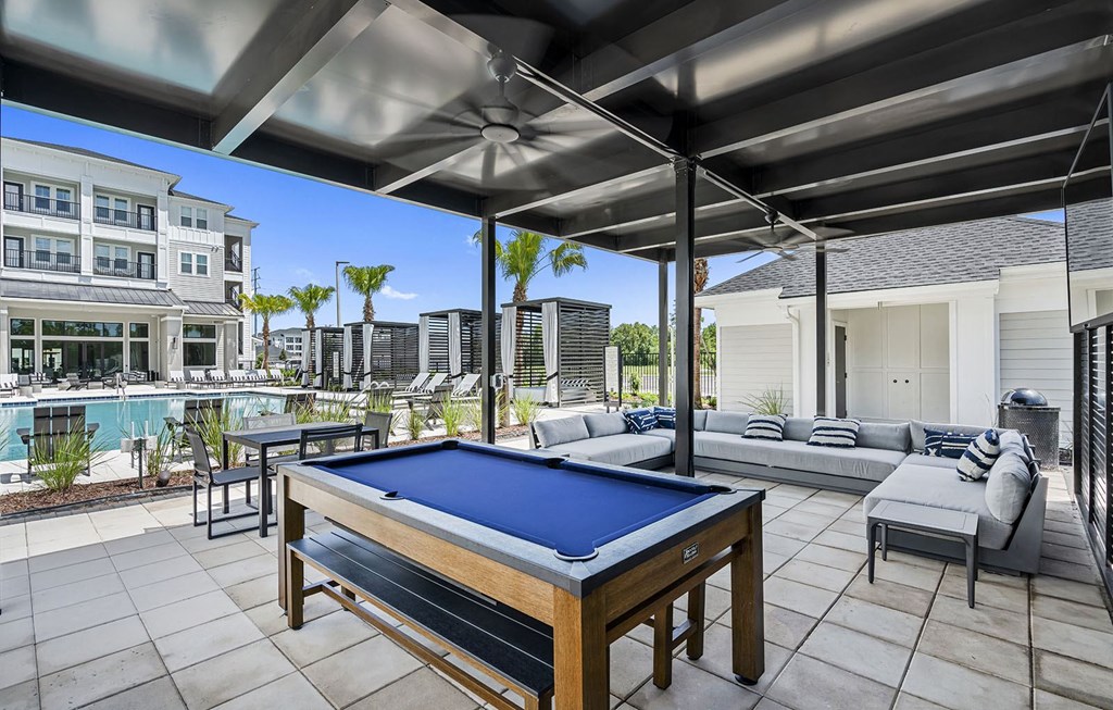 furnished patio with pool table at the preserve at ballantyne commons at Madison Waterford Lakes, Orlando, FL, 32826