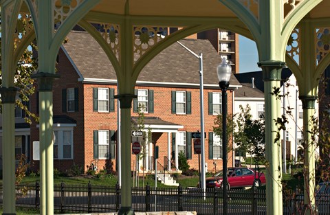 a view of a building from under a covered porch