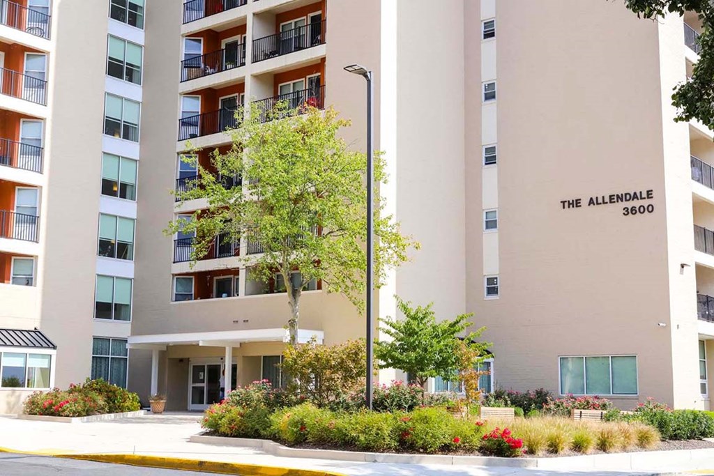 a building with a street light in front of it