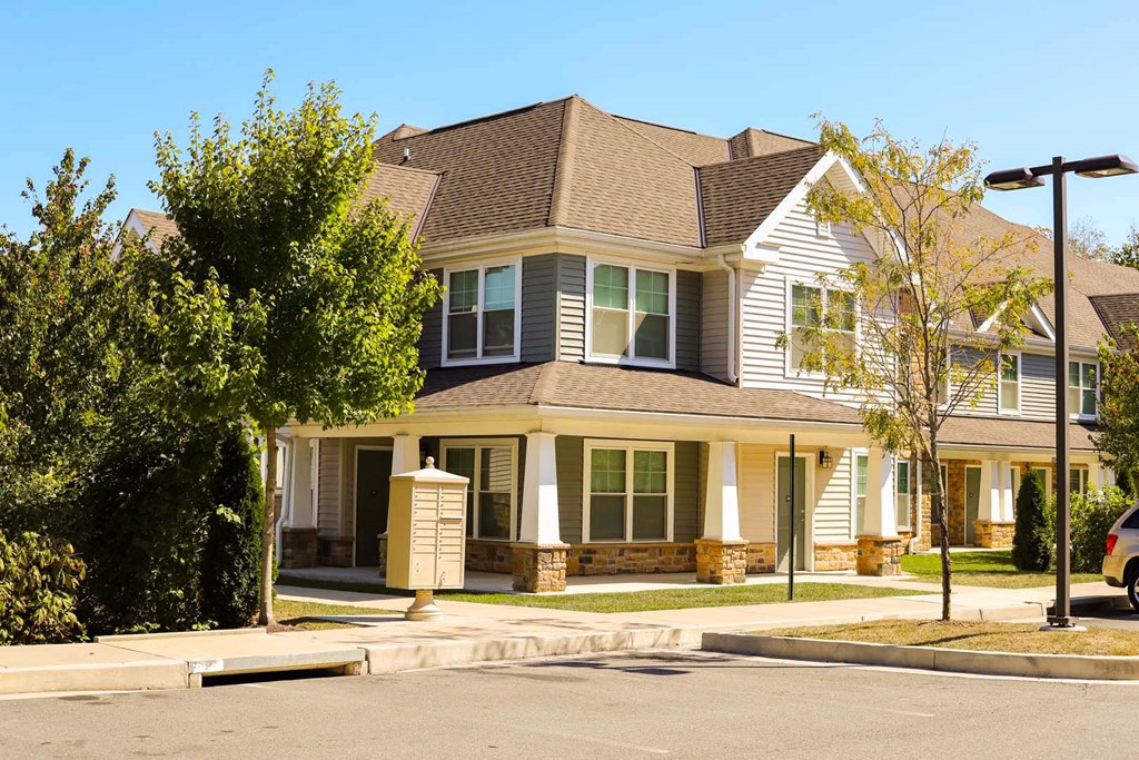 a house on the corner of a street