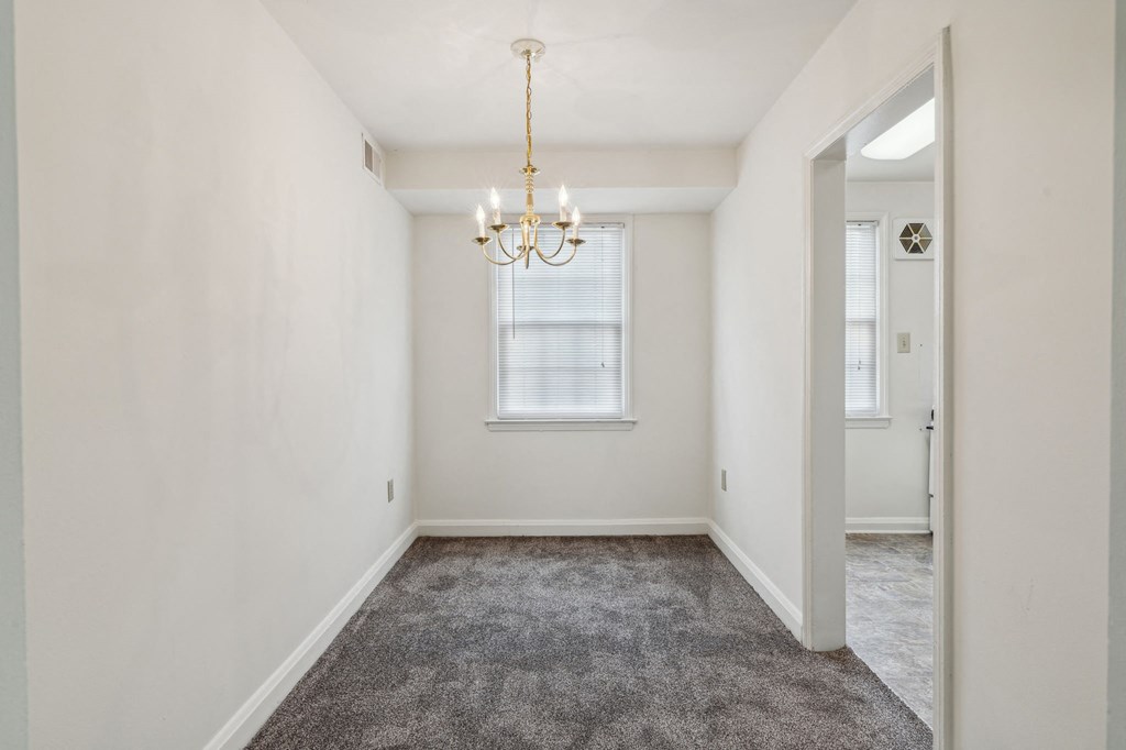 Affordable 55+ apartment in Towson with chandelier and bright natural light