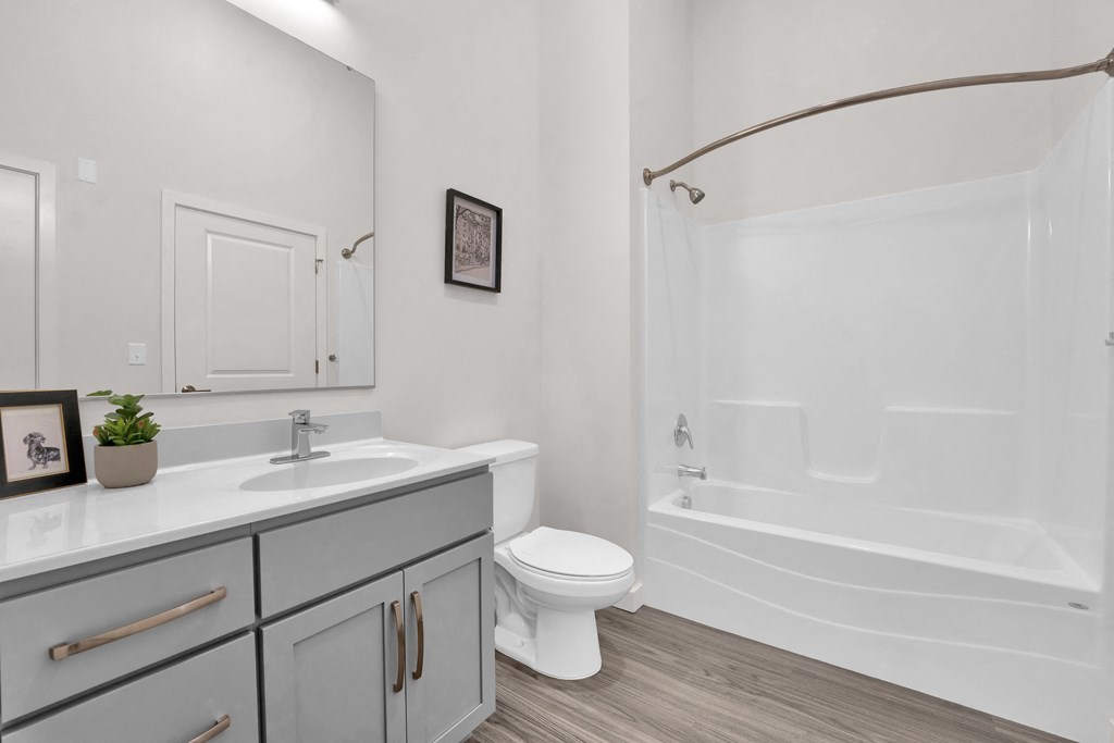Generously sized vanity with tub shower combo at Highland Terrace apartments located in Richmond's Highland Park neighborhood
