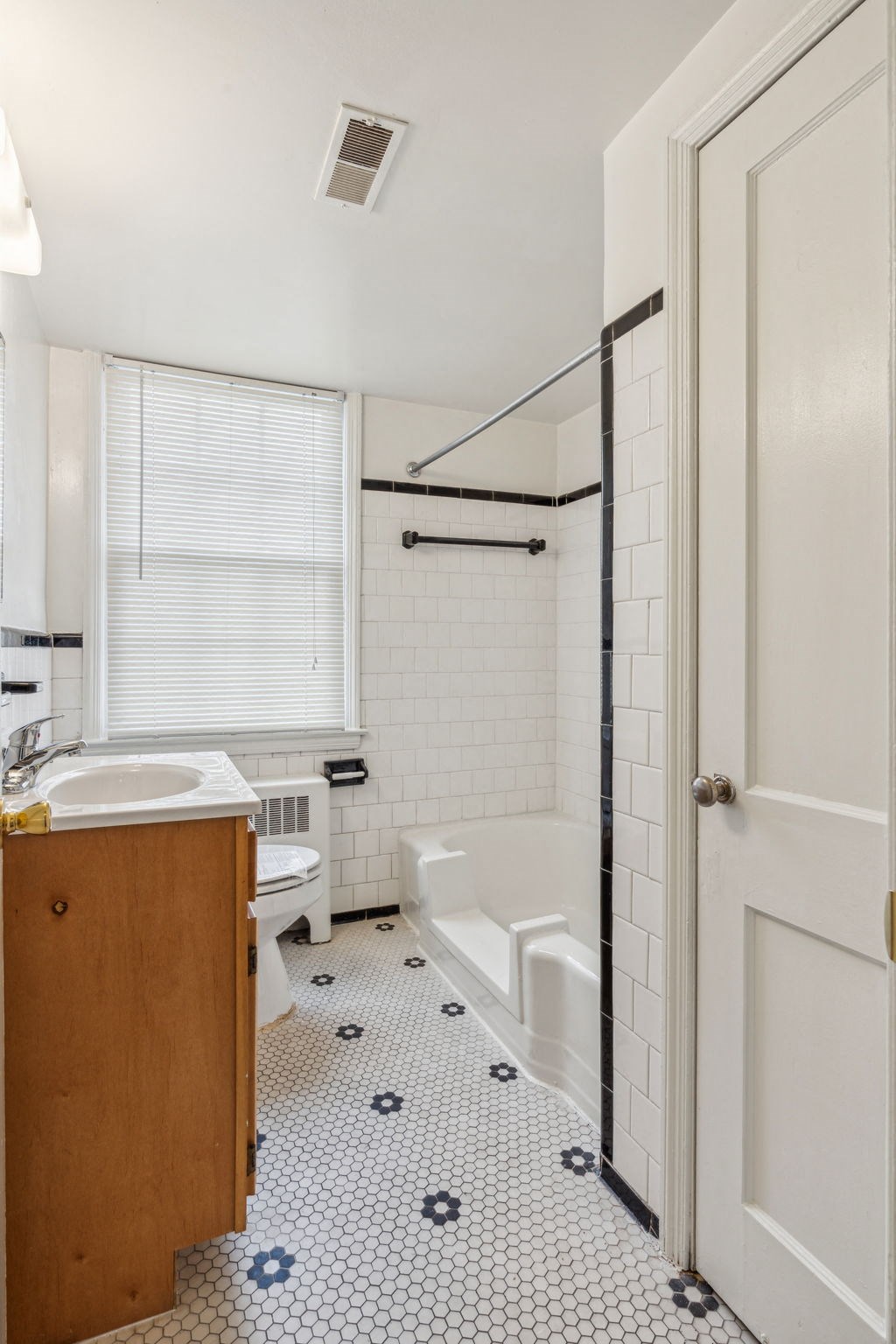 Full bathroom with tub in 55+ apartment at Park View at Towson