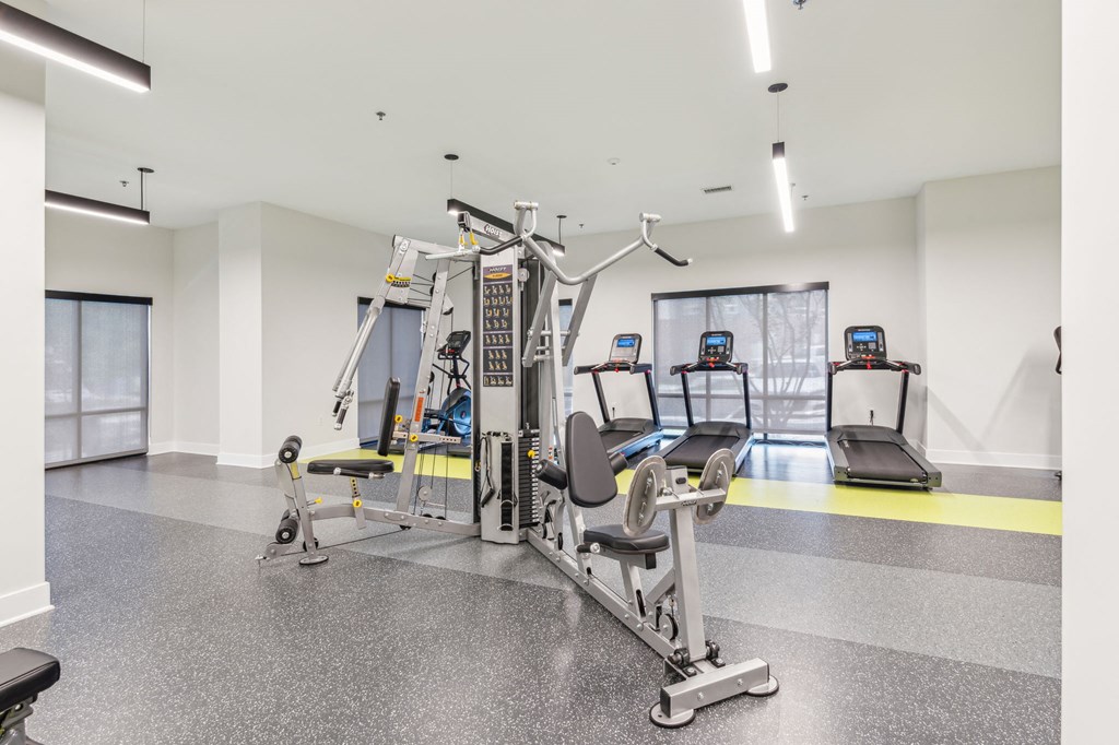 Legacy at Twin Rivers gym with weights and cardio equipment.