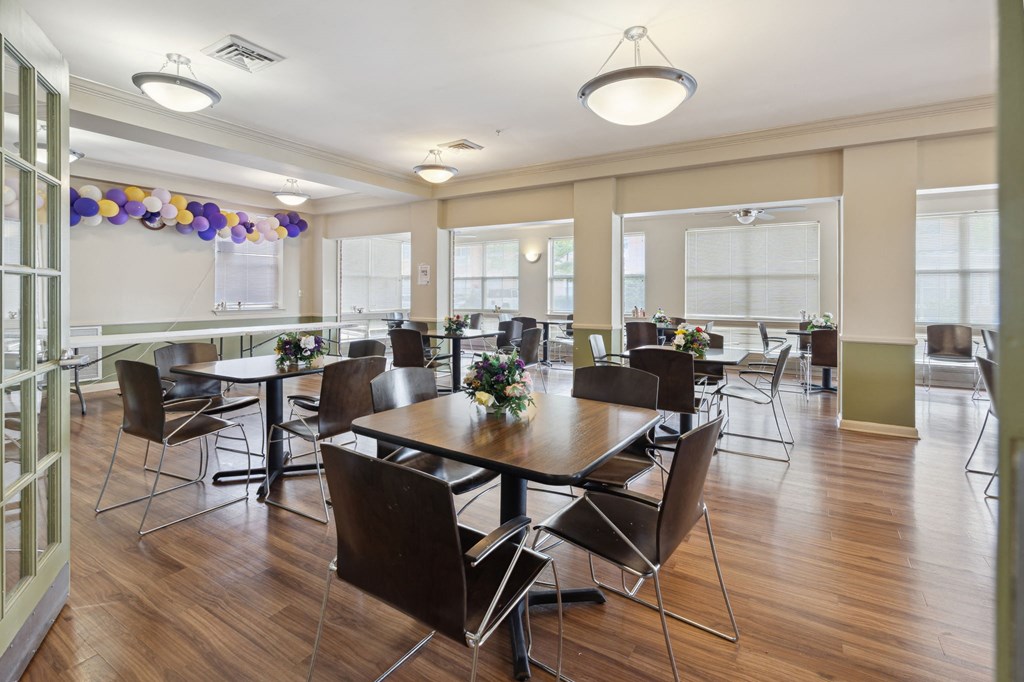 a large room with tables and chairs