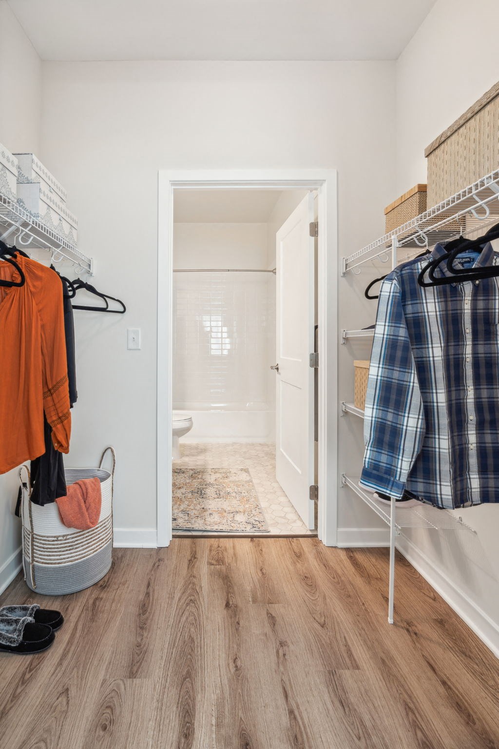 Spacious closet with a door open to a bathroom at Legacy at Twin Rivers