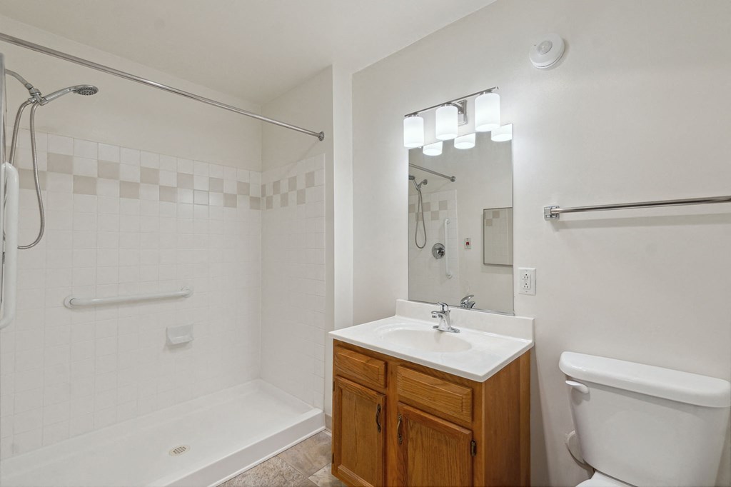 a bathroom with a toilet sink and bathtub
