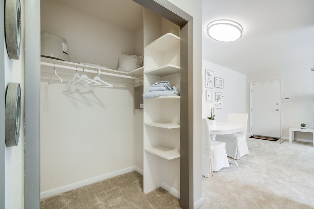 Spacious bedroom closet at Meadowbrook Run Apartments in Congress Heights, D.C., offering ample storage space with built-in shelving—ideal for organizing clothing, shoes, and personal belongings in our thoughtfully designed apartment homes.