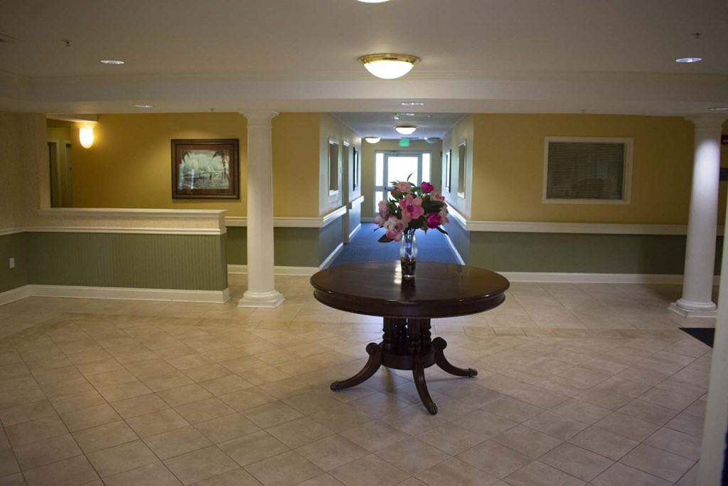 a dining room with a table in the middle