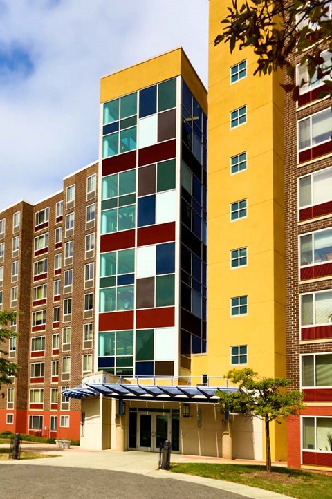 a building with different colors on the side of it