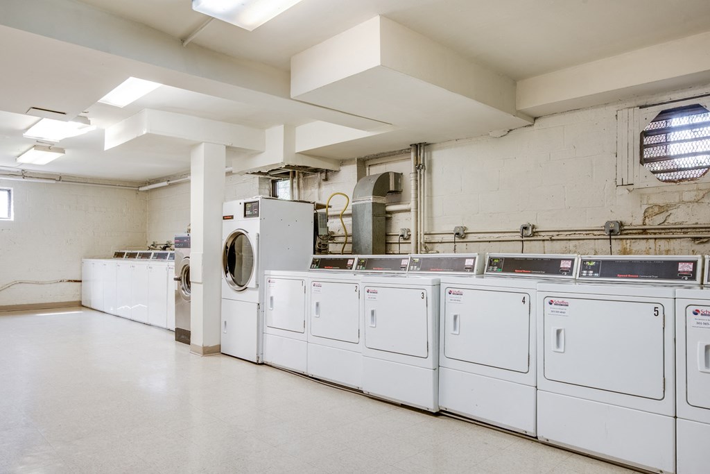 Clean and convenient on-site laundry facilities at Meadowbrook Run Apartments, offering washers and dryers for residents.