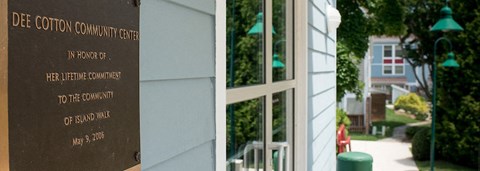 a sign in front of a building