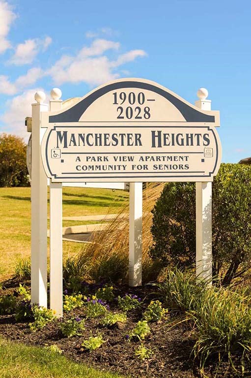 a sign for the heights park view apartment community for seniors