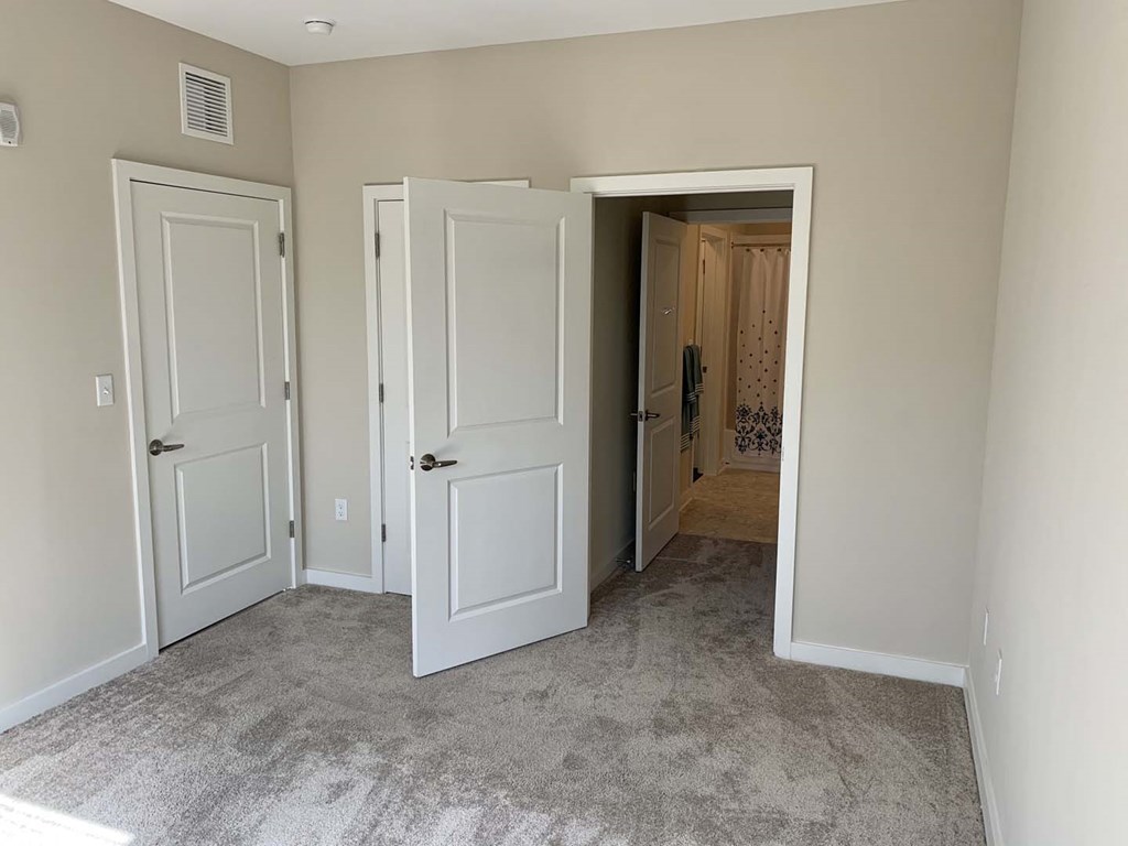 Spacious bedrooms with oversized closets at Metro Heights apartment community near downtown Baltimore.