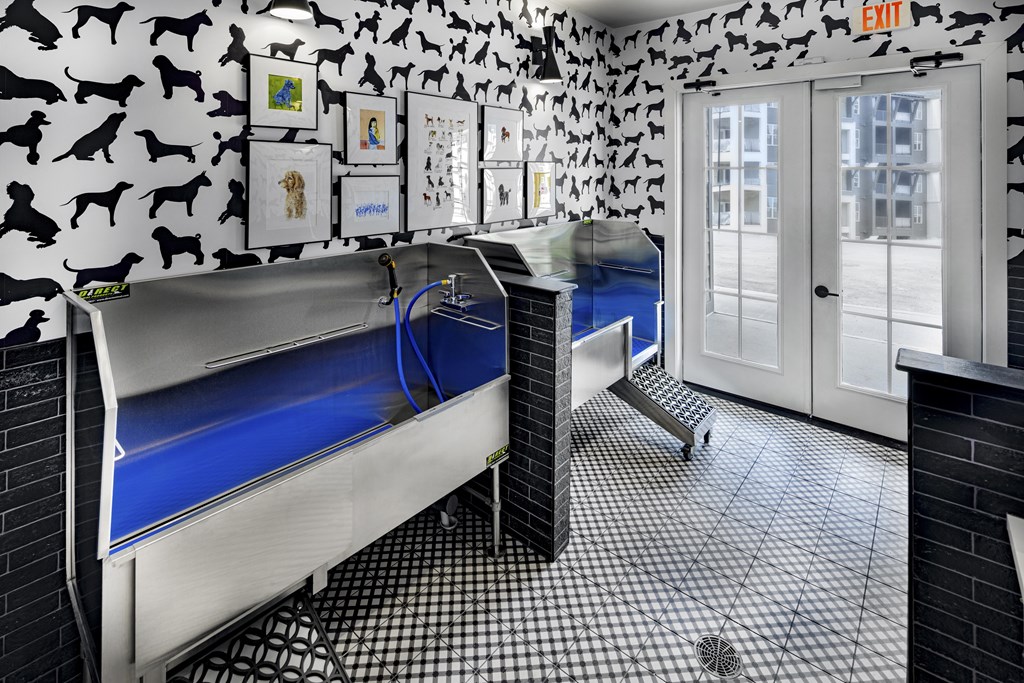 A bathroom with a bench and a sink at Folksong Apartments, Georgia 30542