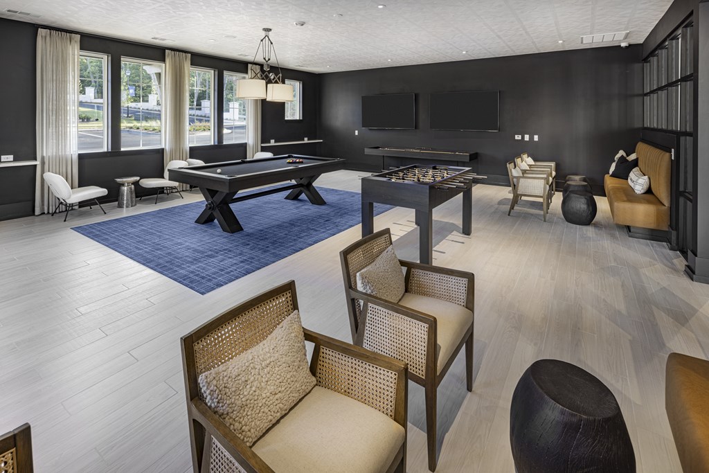 A room with a pool table and a television at Folksong Apartments, Georgia
