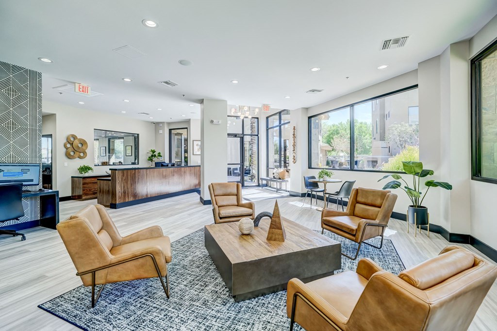 the reserve at city center spacious living room with couches and chairs