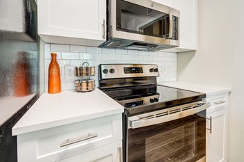 Electric Range In Kitchen at Centerview at Crossroads, North Carolina - Photo Gallery 22