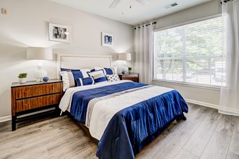 Beautiful Bright Bedroom With Wide Windows at Centerview at Crossroads, North Carolina - Photo Gallery 15