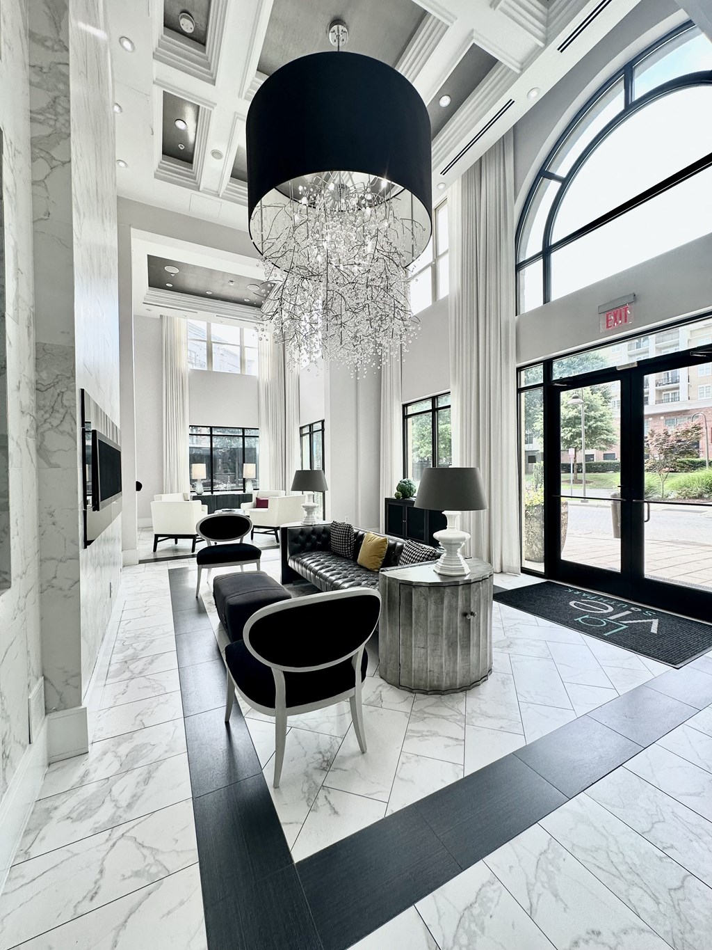 LaVie South Park lobby with seating and crystal chandelier