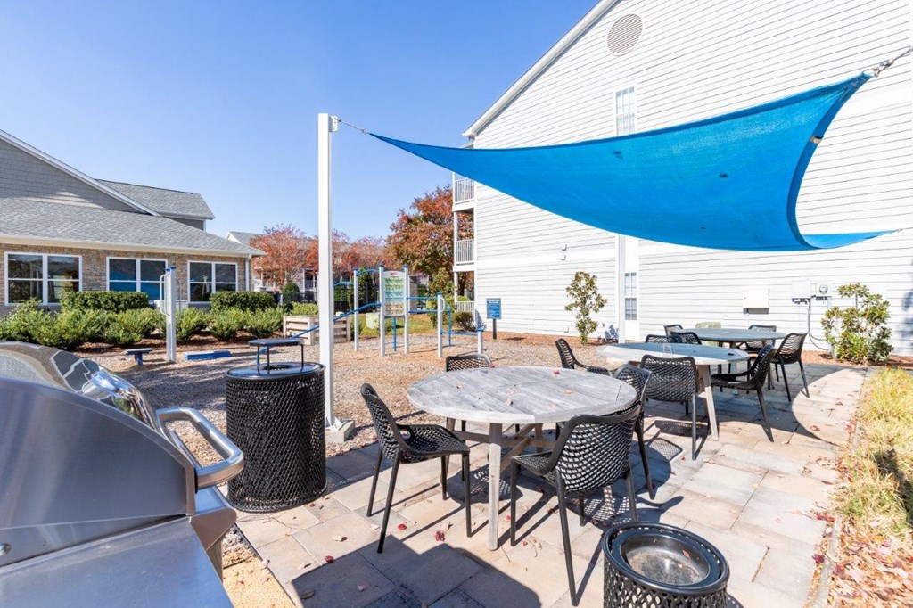 Indigo Apartments Clubhouse Patio with BBQ's