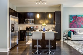 Fitted Kitchen With Island Dining Fitted Kitchen With Island Dining at LaVie SouthPark, Charlotte, 28209 - Photo Gallery 5