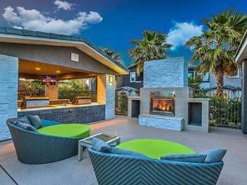 Outdoor Lounge With Firepit at Lyric Apartments, Las Vegas, NV, 89183 - Photo Gallery 17