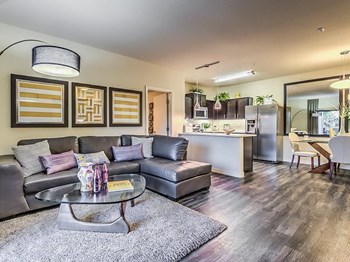 Living Room With Kitchen View at Lyric Apartments, Las Vegas, NV, 89183 - Photo Gallery 9