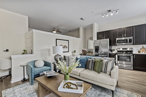 a living room with a couch and a table