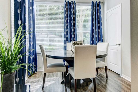 Beautiful Window Coverings, Dinning Table at Tuscany Bay Apartments, Florida