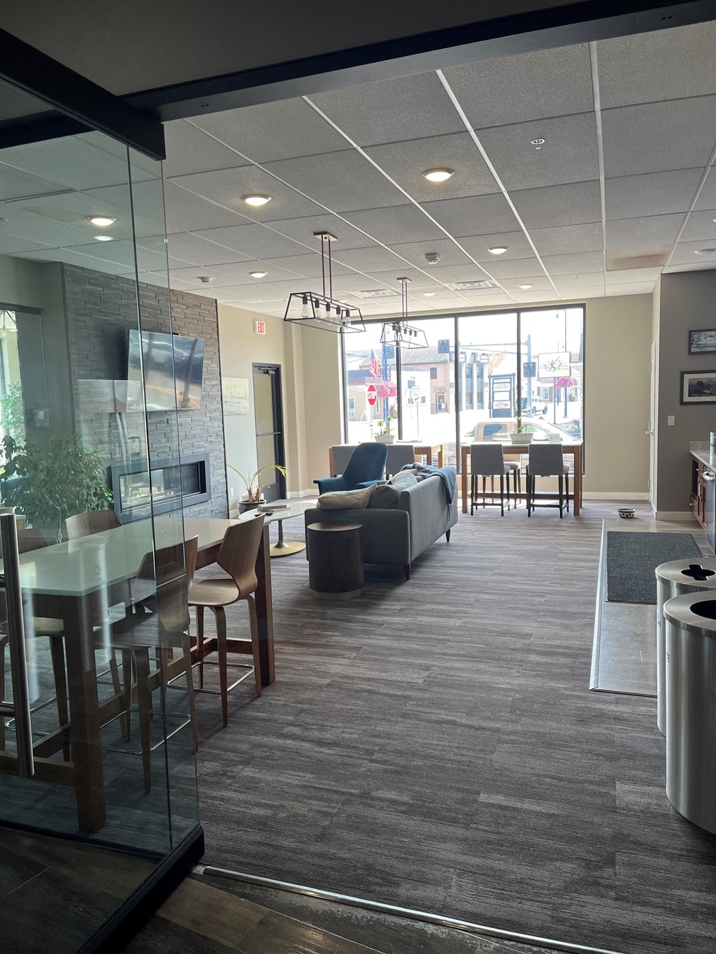 a living room and dining room in an office building