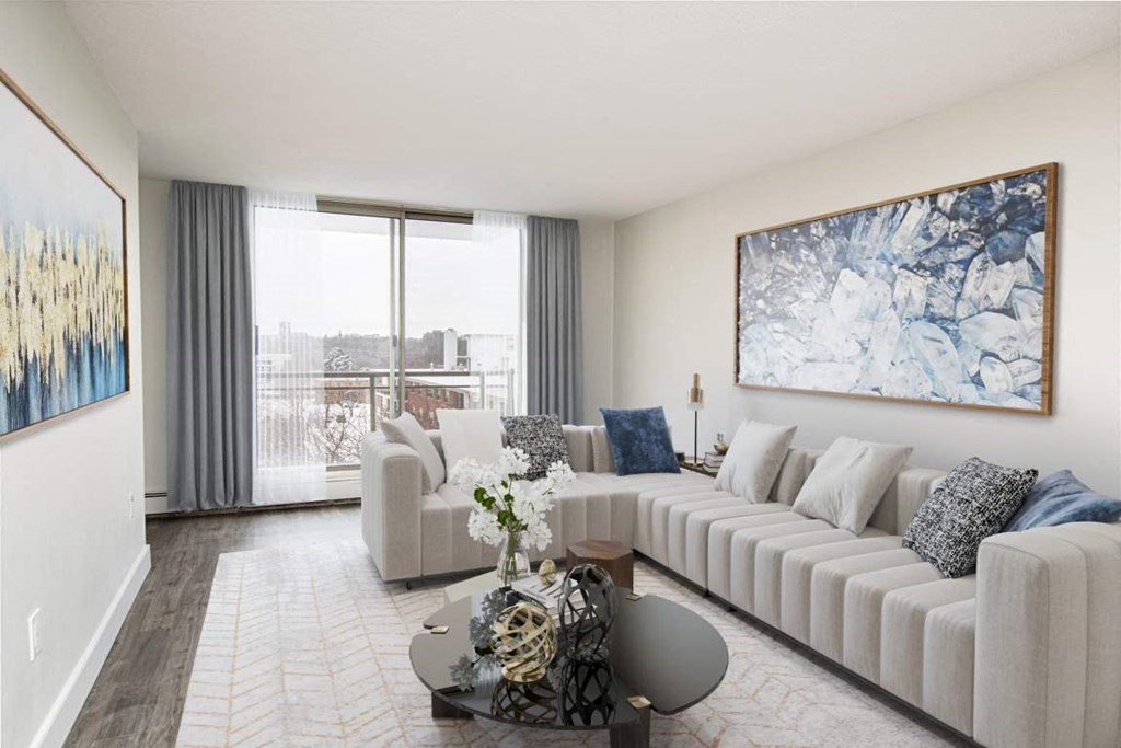 a living room with a white couch and a table