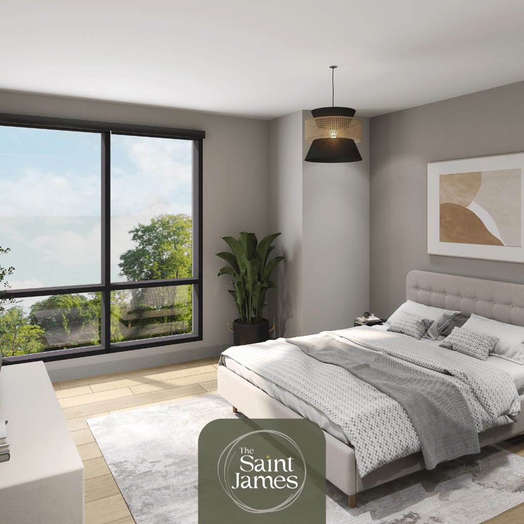 a bedroom with a bed and a large window