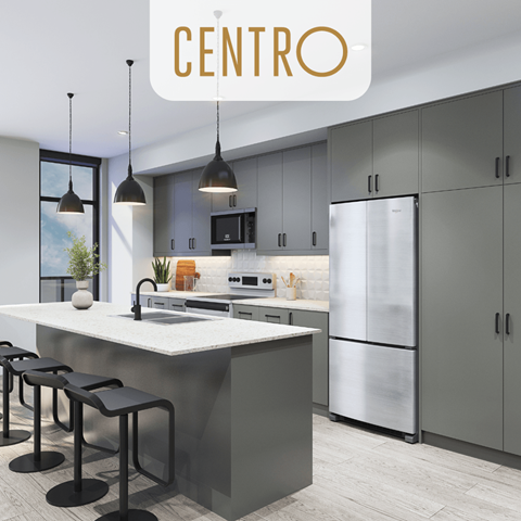 an image of a kitchen with a center island and a stainless steel refrigerator