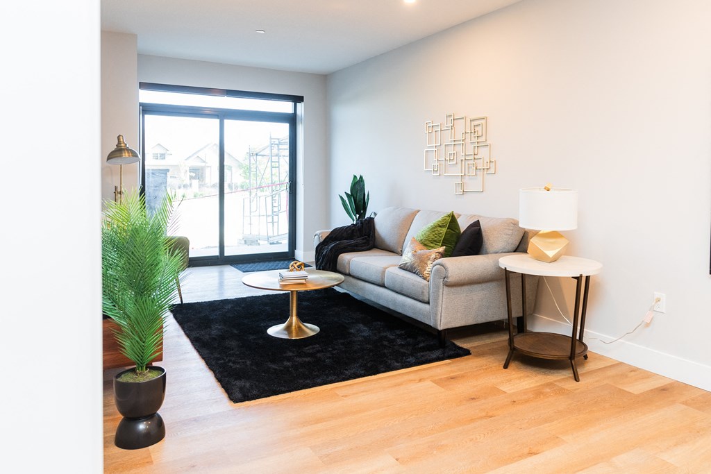 a living room with a couch and a table
