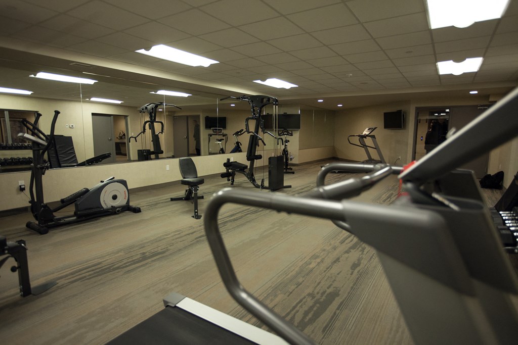 a gym with weights and other exercise equipment