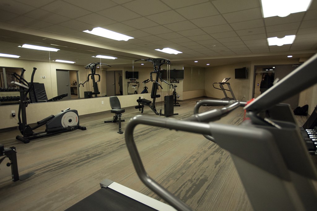 a gym with weights and other exercise equipment