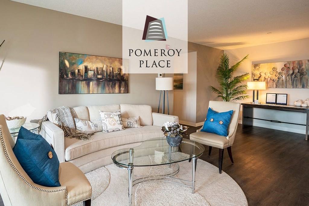 a living room with a couch and a table